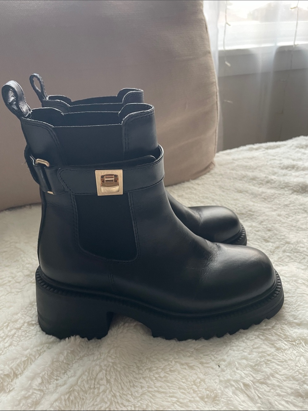Steve Madden Black Leather Lug Sole Chelsea Booties with Gold Buckle